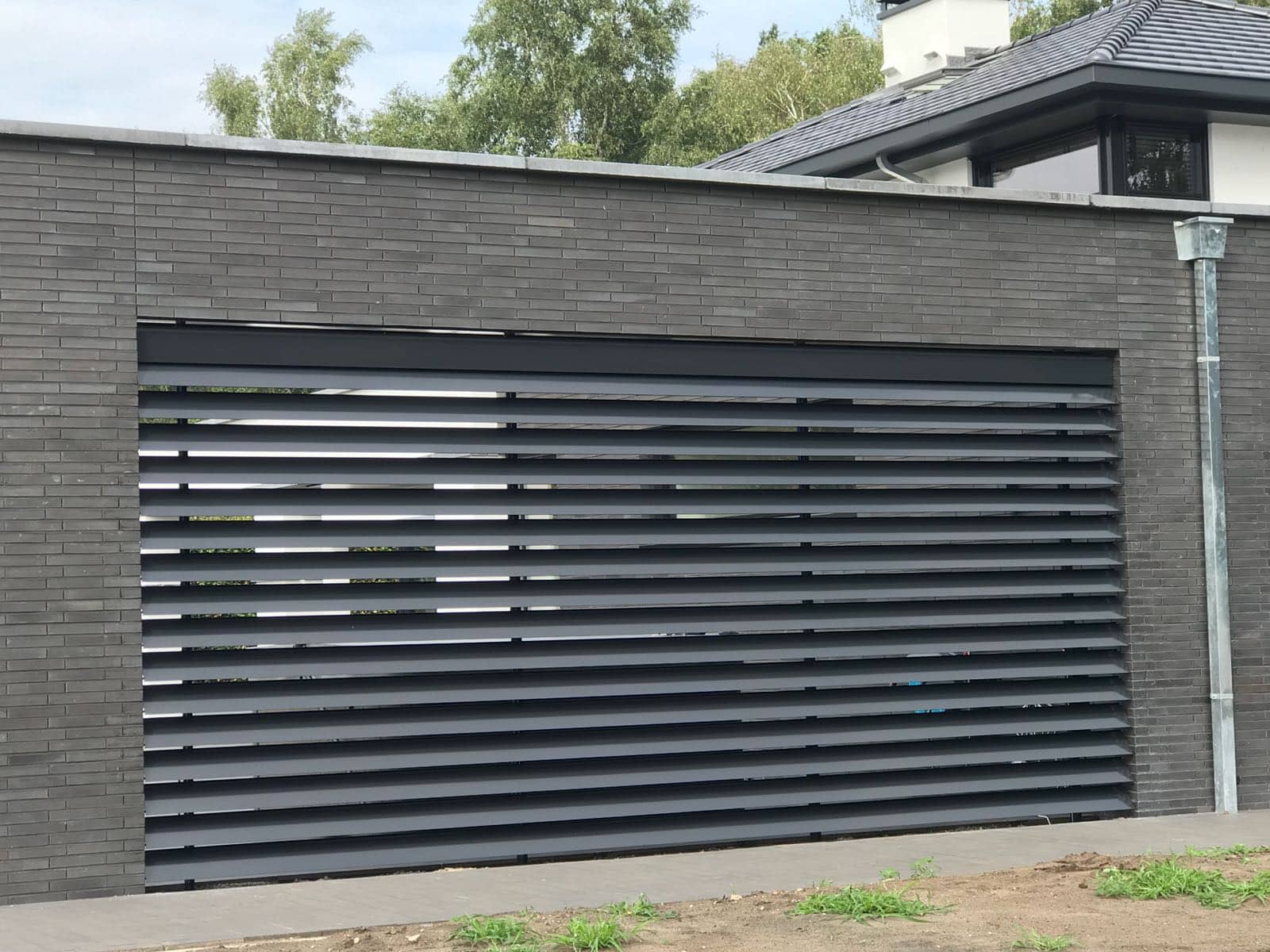 Lamellenwand bij terras in half open stand